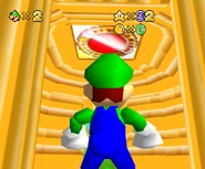 Strange symbol on ceiling of another room. It is a texture (goldtile_txt) from the gigaleak which possibly reads "Ultra Mario Bros."