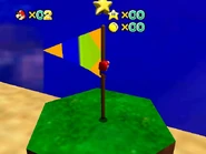 The flagpole with the star above it.