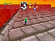 Luigi bravely tries to run past this Mr. I.