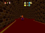 The junction section behind the brick wall and single door.