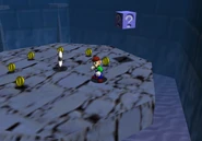 One of the silver stars and the Vanish Cap block on a high platform.