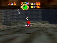 Area behind the waterfall.