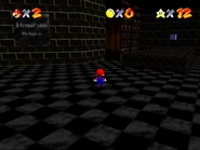 Vanish Cap next to "L is Real" plaque.