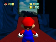 The painting leading to Bob-omb Tower (v0.6.9-v0.8) or Thwomp's Fortress (v0.9+).