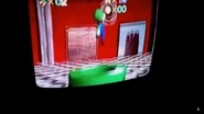 Luigi entering the area via a pipe.