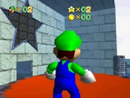 Luigi standing atop a torch.