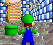 Warp pipe leading to a game crash in a blue and white walled room.
