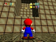 The ? Block at the top of the area; approaching anywhere in the vicinity of the square shaped hole that surrounds the ? Block will send you to Checkerboard.