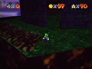 Luigi standing before the entrance to the lighthouse.