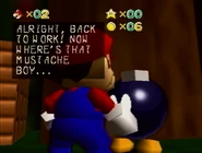Mario speaking to a friendly Bob-omb.