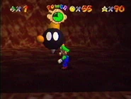 Luigi standing before Prince Bob-omb, ready to claim his star.