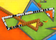 MOAB Domination main kylie dealing 12 damage to bloons