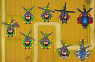 Crosspathing in BTD6 (Top: Path 1, Bottom: Path 3)