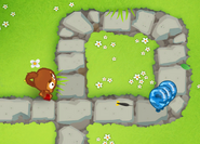 0-0-2 Dart Monkey shooting at a group of Camo Blues from afar