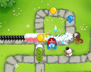 Oversize Nails popping bloons frozen by Ice Shards
