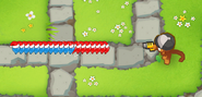 Oversize Nails popping a row of blue bloons, 8 of them being turned into red bloons