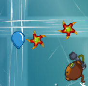 A blue bloon being attacked by a Bionic Arm Boomerang Thrower (2-3).