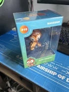 Dart Monkey Vinyl Figure in the box (source)