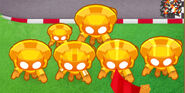 Sun Avatar with crosspath upgrades (Path 3 at right, Path 2 at left) including a tiny Sun Avatar from Sun Temple