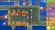 Crosspathing in BTD6 (Top: Path 1, Bottom: Path 3)