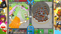 The player on the right has utilized Bloon Adjustment against the opponent's Ninja-Wizard-Farm strategy