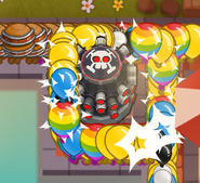 The Tack Zone barrels pushing forward after shooting tacks. The tacks are thinning out a bloon rush (pre-33.0)