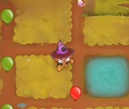 0-0-2 Wizard Monkey in early versions of BTD6 on a low-end device (iPhone SE)