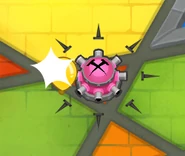 Tack Shooter shooting all 8 tacks, one of which hitting a Pink into a Yellow