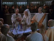 Minbariceremony01.jpg (183 KB) During the Rebirth Ceremony he played the stringed instrument on the right. This scene was included in the opening sequence of Season 1 and Season 5.