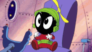In the "Ten Loonies in a Bed" music video, Baby Marvin drives a spaceship on his way home to Mars.
