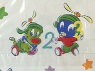 Baby Marvin (and Baby K-9) as he appears on a gift wrap from 2003. While typically Marvin doesn't wear a pacifier, a few merchandise and pictures portray him wearing such.