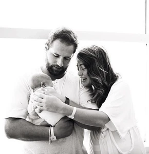Jillian, Justin and their newborn Leo.