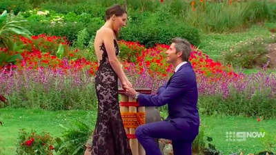 Arie proposing to Becca.