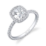 Dylan & Hannah A 2.5-carat ring, featuring a classic cushion-cut diamond that is surrounded by a halo of 20 round diamonds and further accented with 62 round diamonds in the band. It’s handmade, set in platinum and made by Neil Lane.