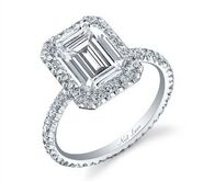 A $68,000, 3.5-carat ring by Neil Lane with an emerald-cut diamond accented with 87 round-cut diamonds, set on a pave diamond band.