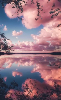 This photo of Level 702, taken by anonymous wanderer, D.D., shows the Ethereal Grounds at the onset of the Nuages Roses Pluie Noire phenomenon at an  lake.