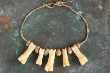 A traditional sluggard necklace, utilizing parts from damaged tools.