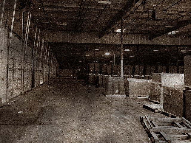 Backrooms Level 1 is a massive warehouse with concrete floors and