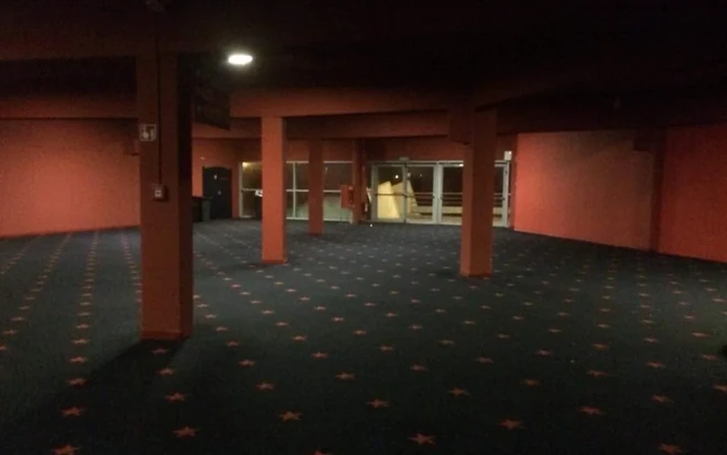 The first known image of Level 156, displaying one of the frequently found lobby rooms and an exit to the Outside.