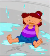 Kiesha at the bottom of an empty pool in the credits of Backyard Baseball 2003.