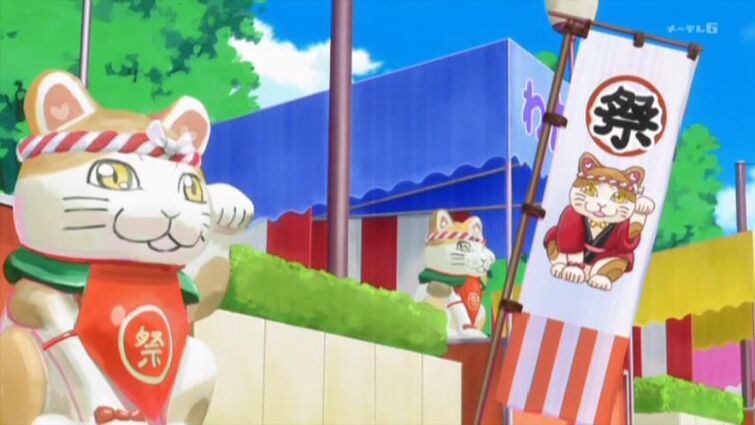 What do you know maneki-neko (beckoning cat) that appears in Delicious  Party Precure in detail?