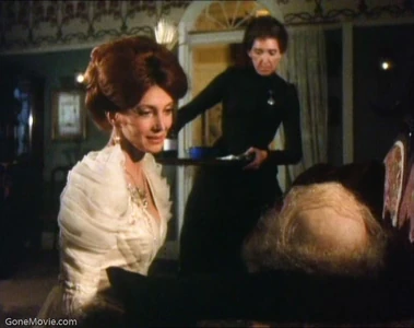 Adler comforting a disguised Holmes