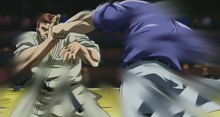 Katsumi fighting Kaoru Hanayama.