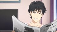 Eiji grins at Ash