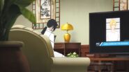 Yut-Lung watches Tv