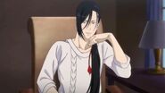 Yut-Lung rests his hand by his chin