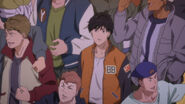 Eiji watches the result of the fight