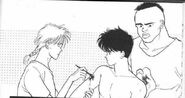 Bones and Kong help to clean up the gunshot wound on Eiji