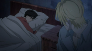 Ash looks over Eiji