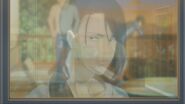 Yut-Lung watches Eiji from inside